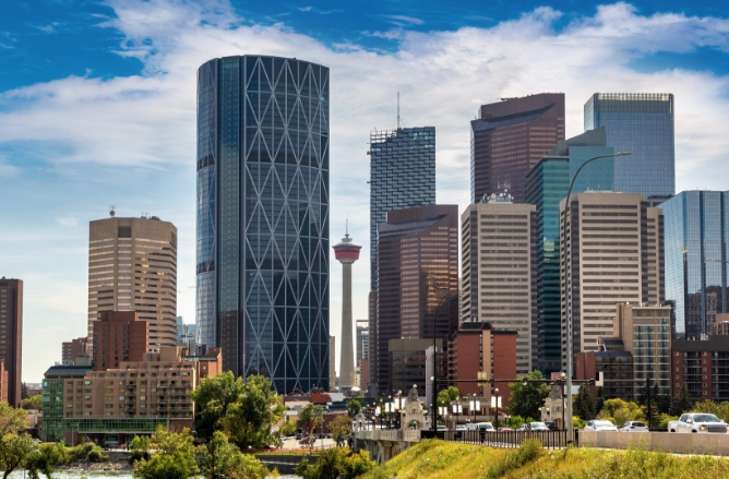 Image of downtown Calgary skyscrapers on a sunny day.